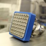 Close-up of Multi-head Sauce Depositor with Quick Fire Head nozzles for precise sauce application