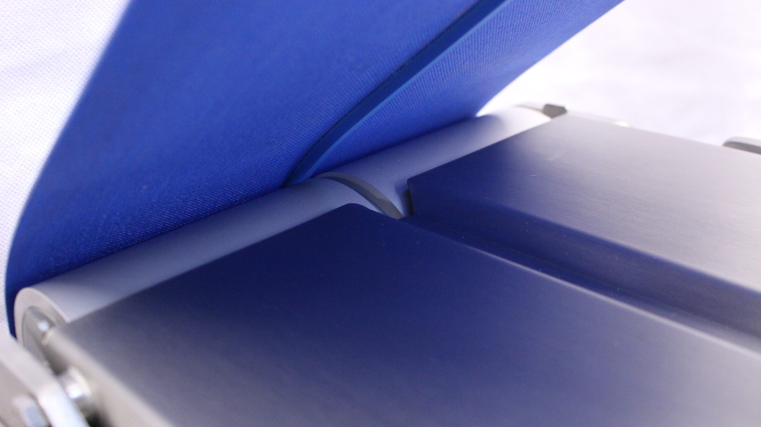 Hygienic Transfer Conveyor with the conveyor belt lifted and positioned for removal, showing easy-cleaning process.