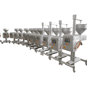 Multiple Volumetric Sauce Depositors (VSDs) arranged in a row