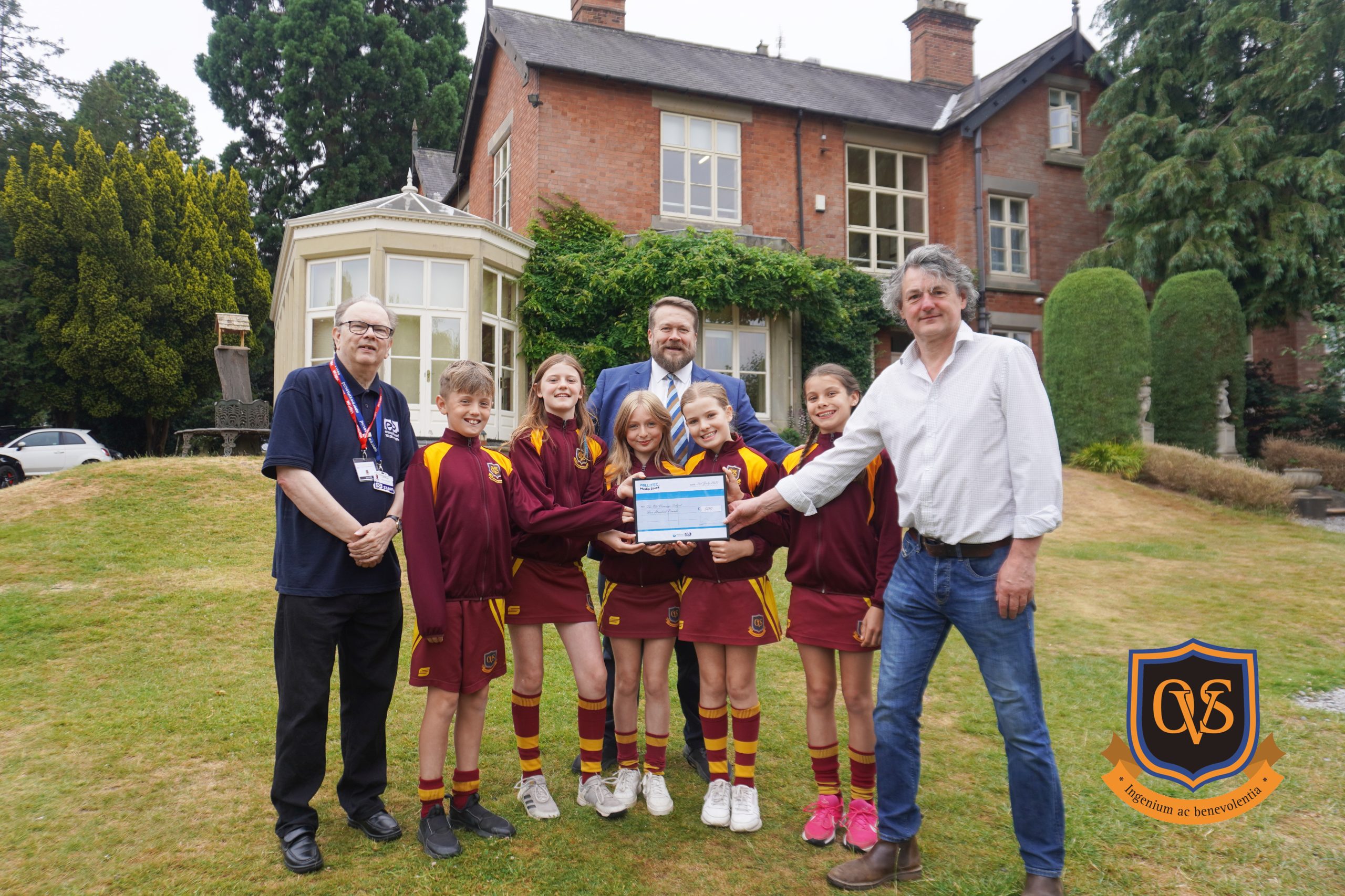 The Old Vicarage School prize presentation Richard Ledger, Managing Director of Millitec, and Jeff Martin, Station Manager at Erewash Sound, presenting a prize to five students from The Old Vicarage School as runners-up in the Media Starz radio competition.
